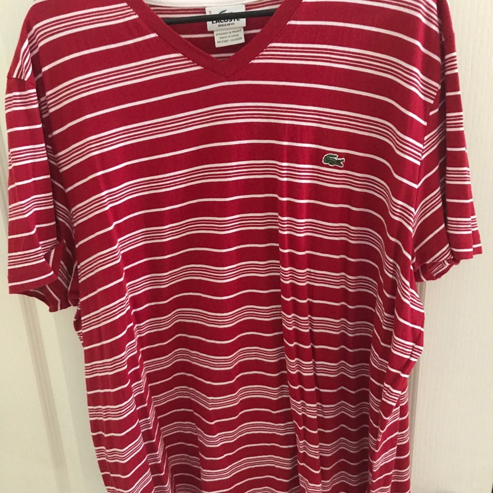 Five men’s Lacoste shirts